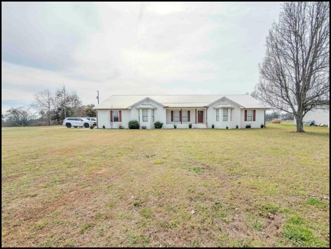 Home for sale through Apex Real Estate in Hillsboro, AL