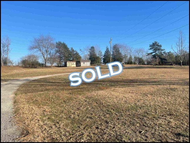 Lot for sale in Rogersville, Alabama through Apex Real Estate.